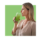 image of girl drinking liquid out of a glass