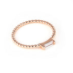 ADRIENNE - Spiraled Baguette Ring