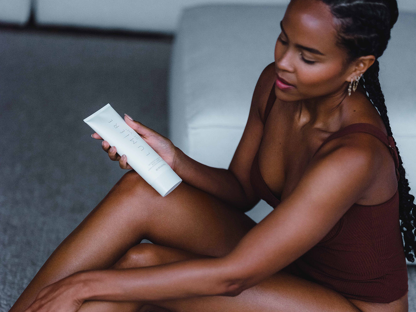 Woman applying lotion